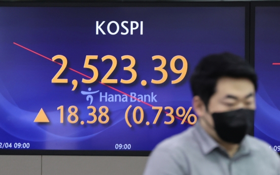 Seoul shares open higher on Fed's rate pause hopes