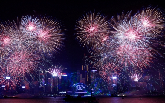 New Year's Eve celebrations roll across Asia, but wars cast a shadow on 2024