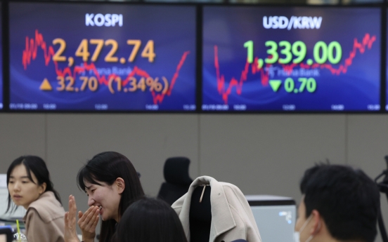 Seoul shares open slightly higher on tech gains