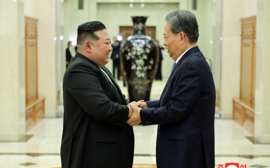 N. Korea's Kim vows to further develop ties with China
