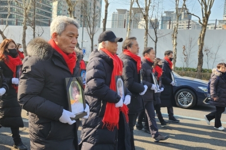 Families of crowd crush victims hold memorial rally in downtown Seoul