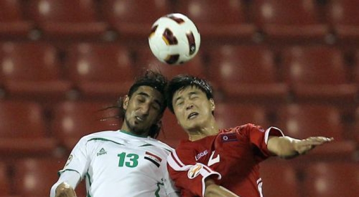 Iraq trips N. Korea to reach quarters