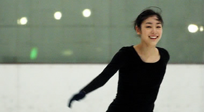 Kim Yu-na looks forward to world championships