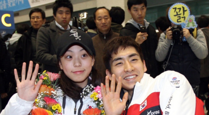 Korean athletes return home