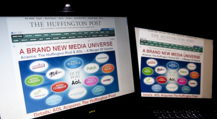 AOL steps up news, ad push with Huffington Post