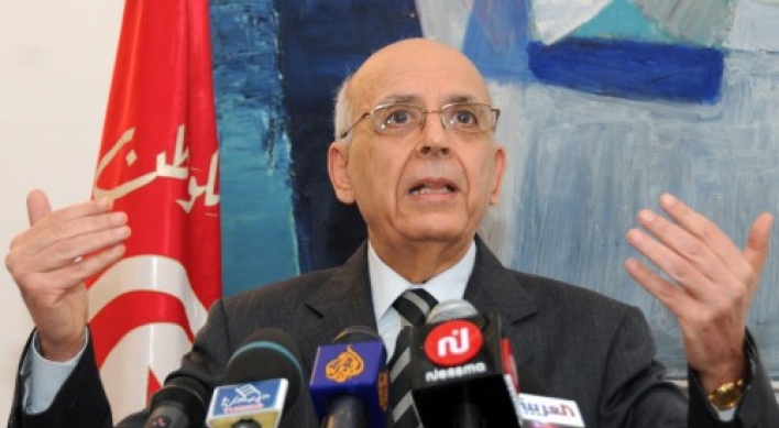 Tunisia gets new premier after new violence