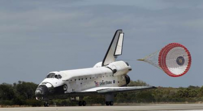 Discovery lands after final voyage