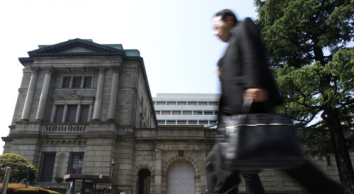 Japan feeds more money to banks