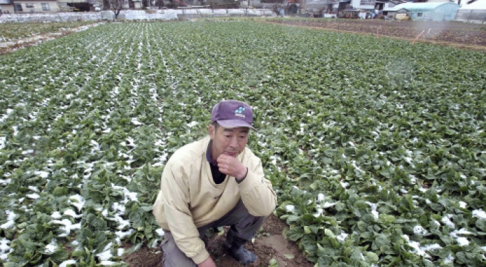 Japan’s farmers battle nuclear scare