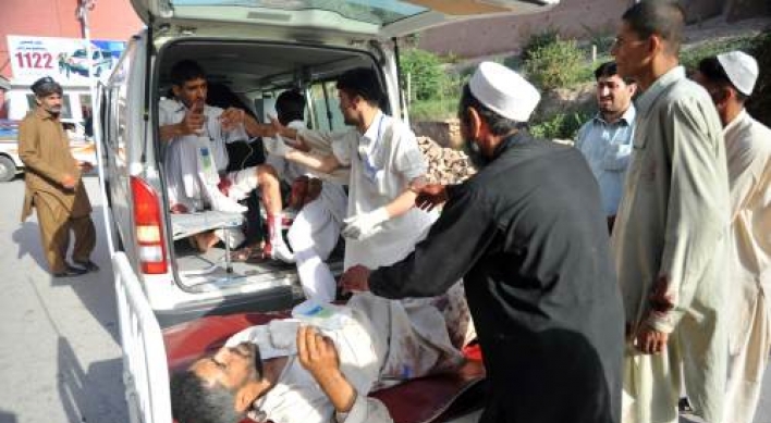 Police: 68 killed in bombings in NW Pakistan