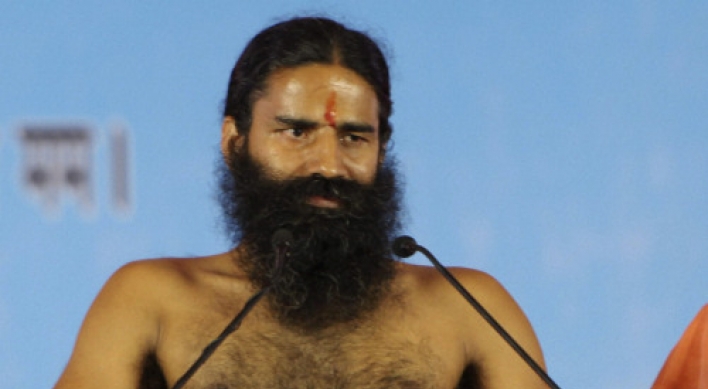 Police break up yoga guru’s hunger strike