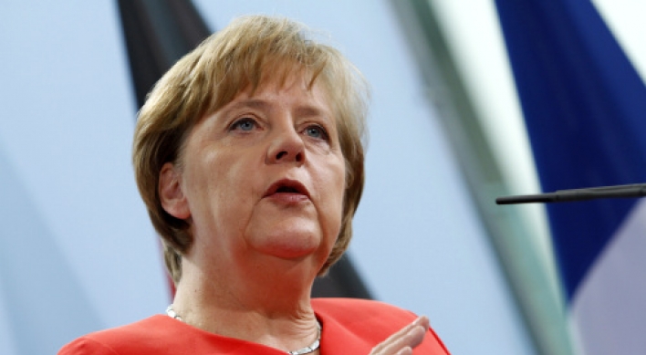Merkel warns against Greek debt restructuring