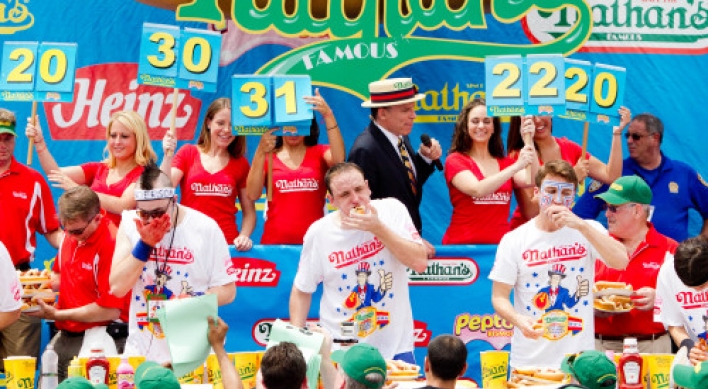 Man eats 62 hot dogs in 10 minutes