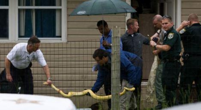 Parents on a trial as a pet python kills two-year-old daughter