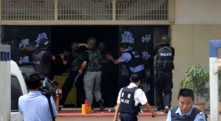 Seven killed in knife attack in China's Xinjiang