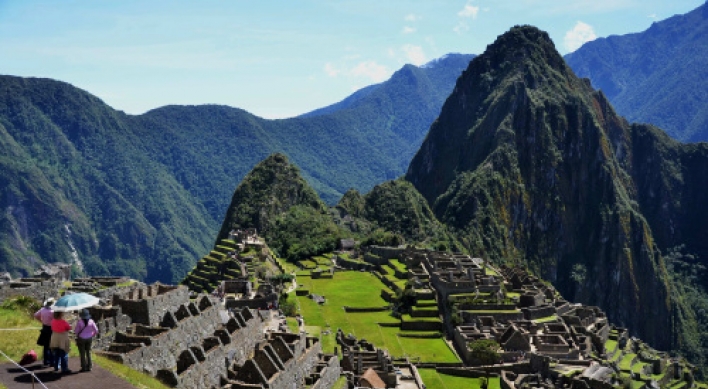 A century after rediscovery, Machu Picchu still dazzles, which may be its downfall