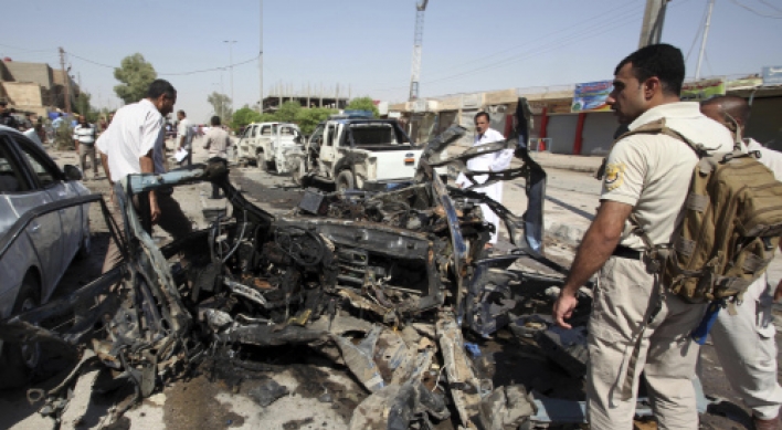 Bombs tear through 17 Iraqi cities, 63 killed