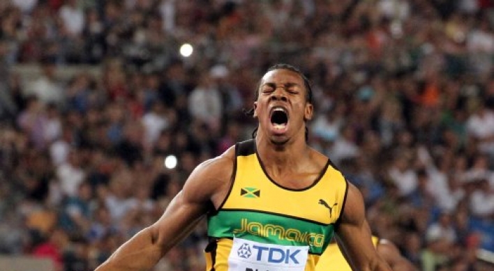 Blake wins world 100m title after Bolt disqualified