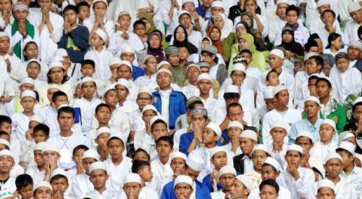 Indonesian Muslim youths keep faith amid reform