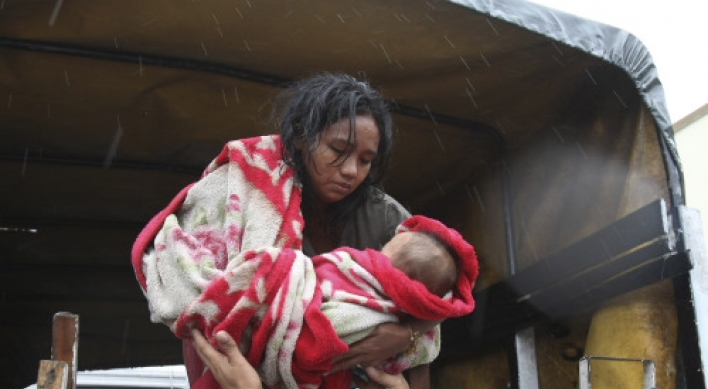 Typhoon floods Manila; thousands evacuated, 7 dead