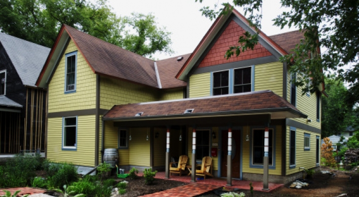 Modest 19th-century house lives larger but blends in, thanks to thoughtful makeover