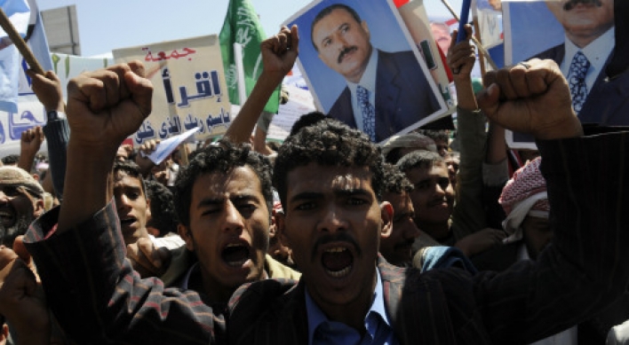 Gadhafi's death energizes Syrian, Yemeni protests