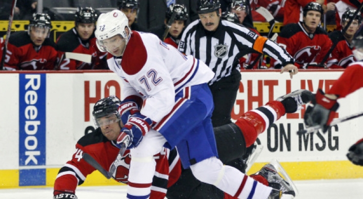 Devils downed as Kaberle shines in Canadiens debut