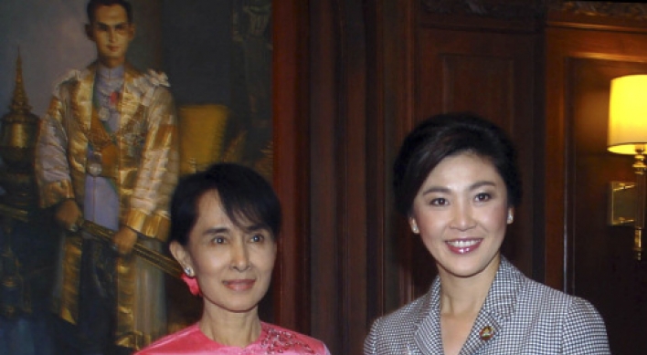 Thai P.M. first ASEAN leader to meet Suu Kyi