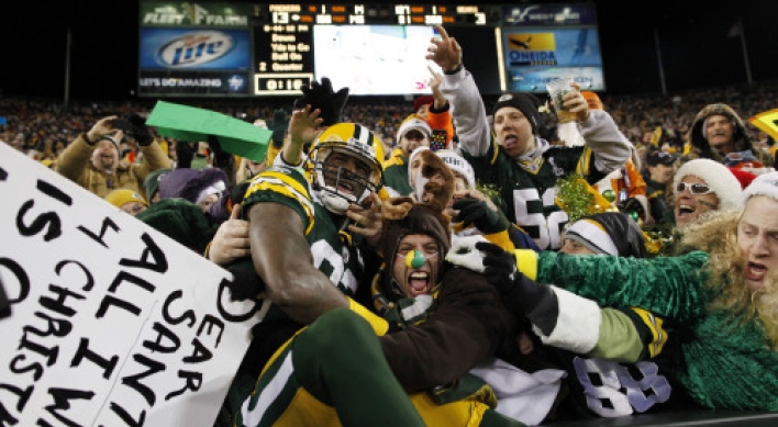 Rodgers, Packers lock up top seed