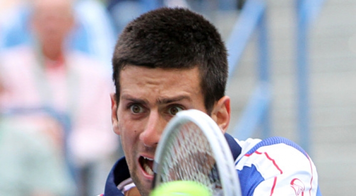 Djokovic steps up to dominate