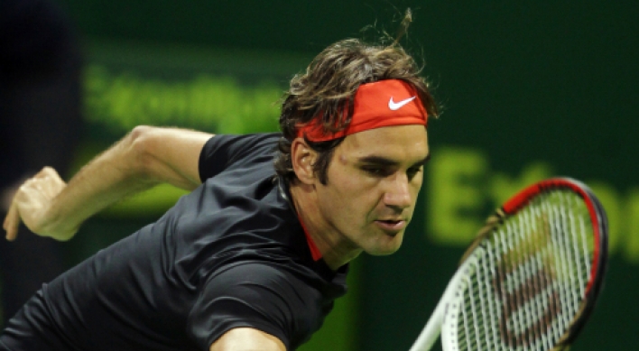 Nadal, Federer into quarters