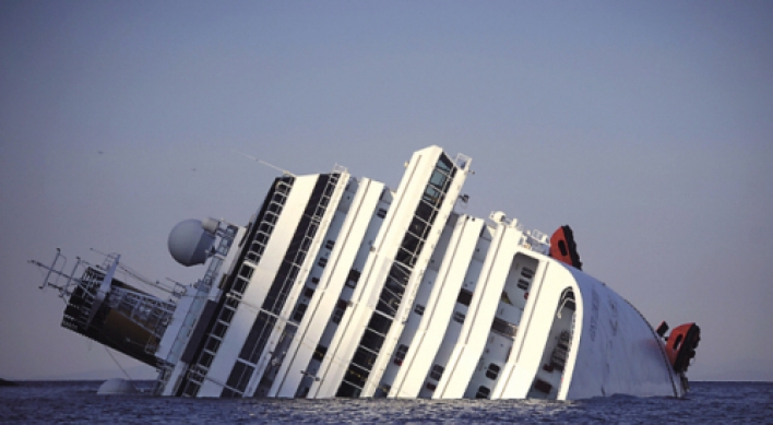 Ship aground off Italy; 3 bodies found