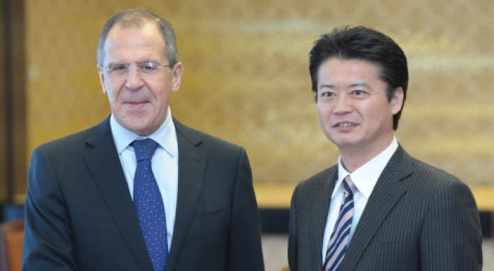 Japan, Russia to boost ties despite islands row