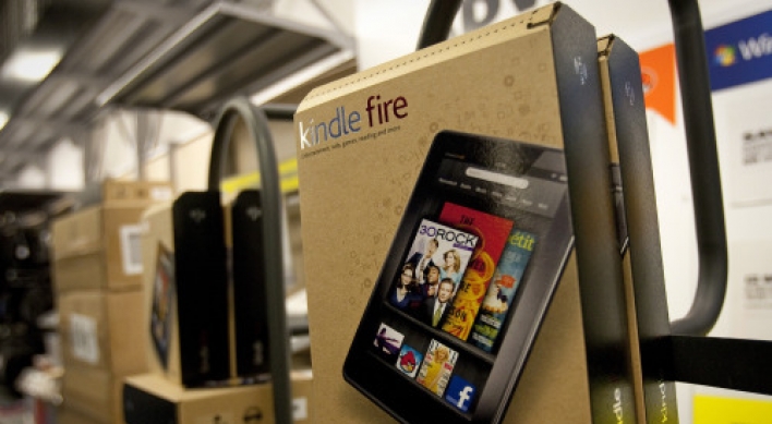 Amazon profit falls 57% on shipping costs, Kindle Fire