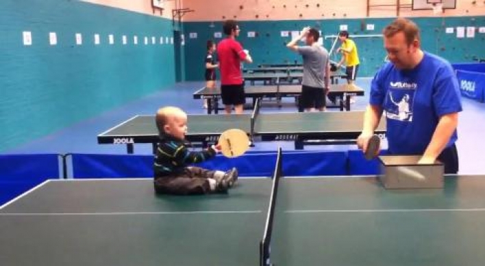 Video of a toddler playing ping-pong wildly popular on-line