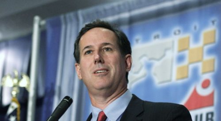 Santorum challenges Romney in Detroit