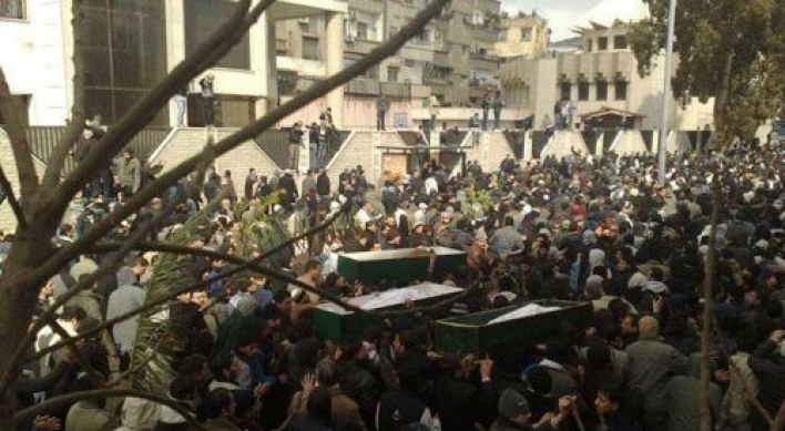 Syrian forces fire on funeral in Damascus