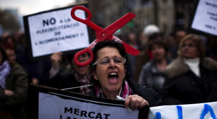 Thousands protest Spain’s new labor reforms