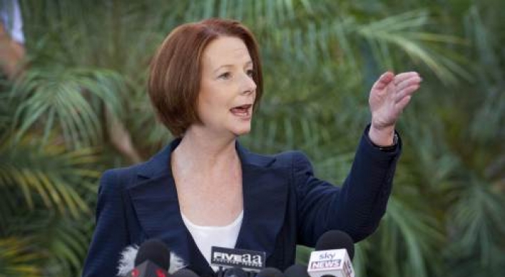 Australia’s Gillard calls a leadership vote