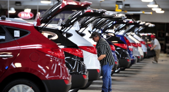 Detroit automakers race to keep up with sales