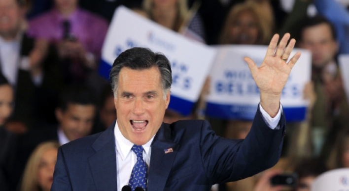 Romney wins primary races in Michigan, Arizona