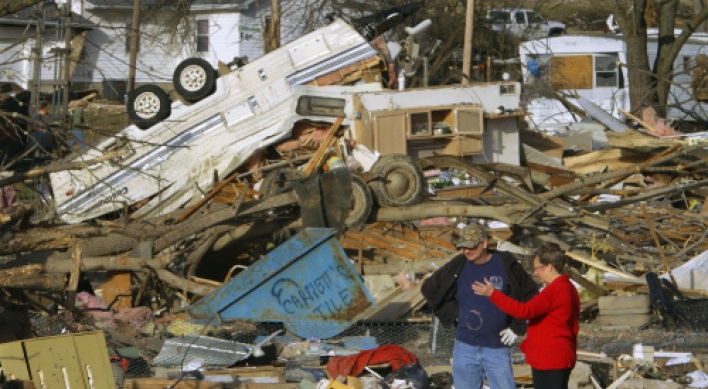 At least 12 dead as tornado strikes U.S.