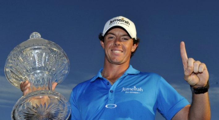 McIlroy holds off Tiger to claim No. 1 ranking