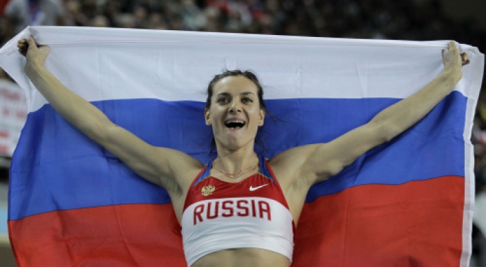 Isinbayeva wins pole vault gold