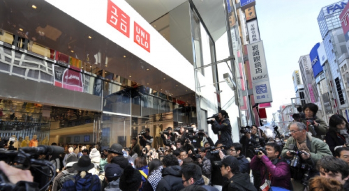 Cheap Uniqlo booms in deflationary Japan