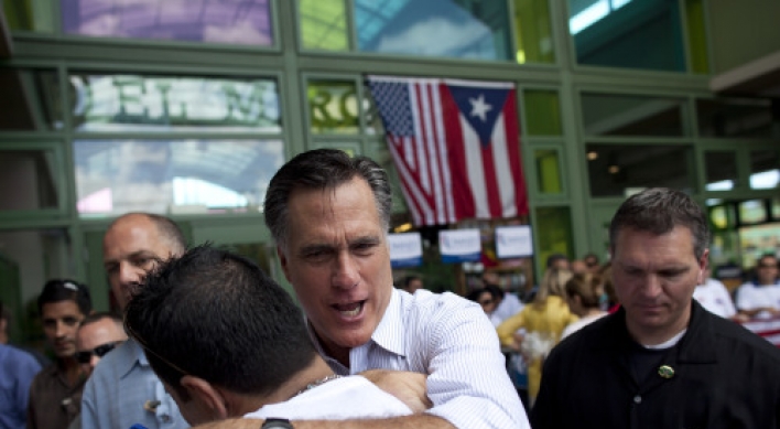 Romney looks to extend lead with Illinois win