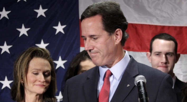 Santorum quits race, handing Romney Republican crown