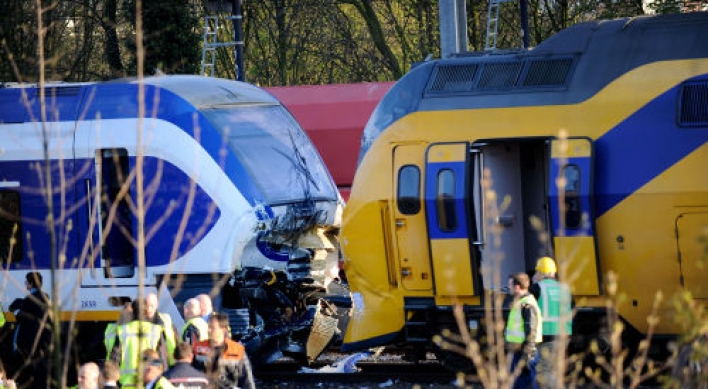 60 injured in Amsterdam two-train crash: police