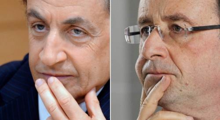 Hollande, Sarkozy heading to French vote runoff