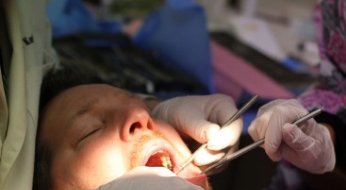 Bitter Polish dentist pulls out all of her ex-boyfriend’s teeth